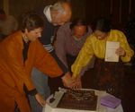 Camilla, Brian, Gary and Annabel cut the Ten Year Turn cake
